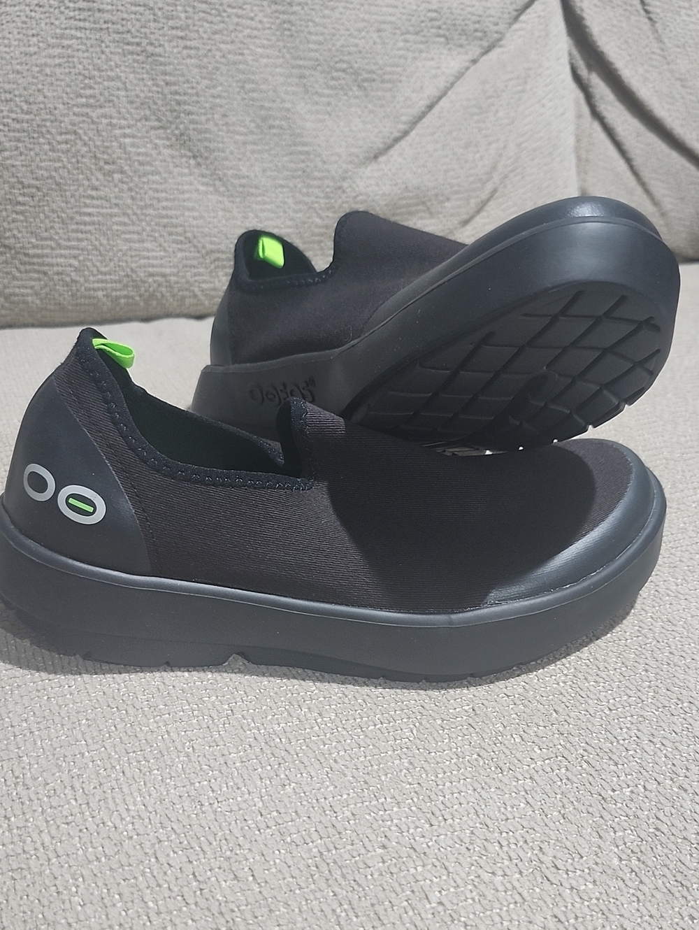 OOFOS Women  Black Slip-On Sneakers with Neon Green Accents